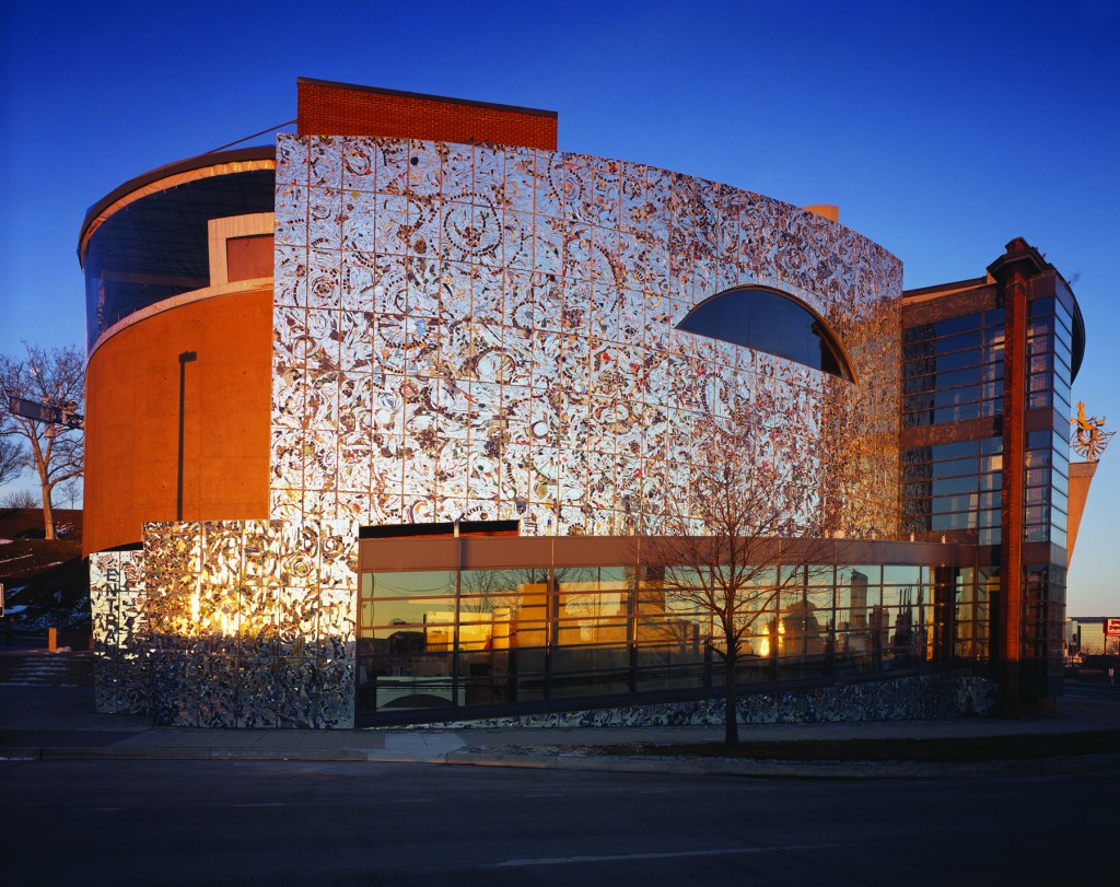 A spherical building with a mirrored facade