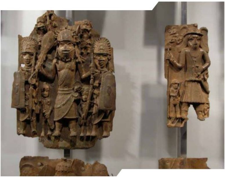 A set of indiginous objects hanging on display. 