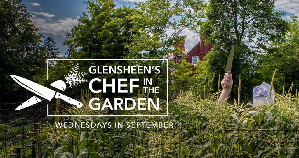Promotional image of corn growing near the Glensheen mansion with someone wearing a chef's hat and carrying a sharp knife stand in the midst of the corn, their face obscured, with "Glensheen's Chef in the Garden. Wednesdays in September" overlayed in white letters to the right of the image. 