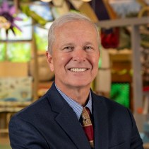 Headshot of Doug Jones in museum