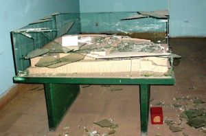 View of glass broken damaged display case.