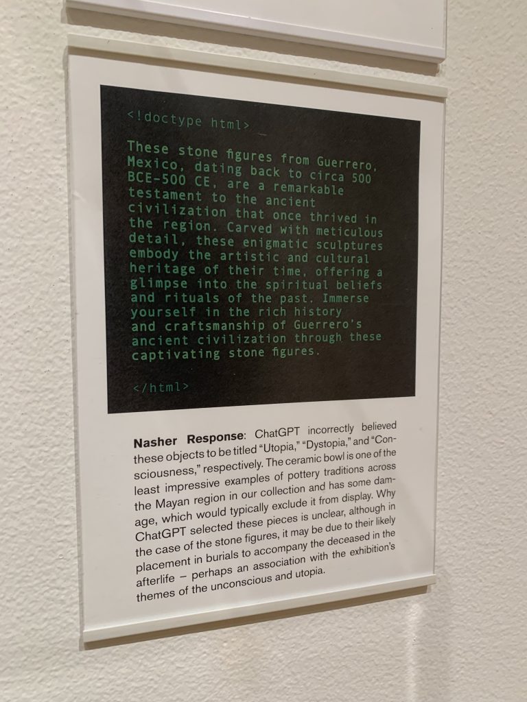 The label in the gallery for three Mayan sculptures included in exhibition by ChatGPT. The design to differentiate the ChatGPT-written labels (top) and the human curator responses (bottom) were done by Joel Johnson, the museum’s Head Graphic Designer.
