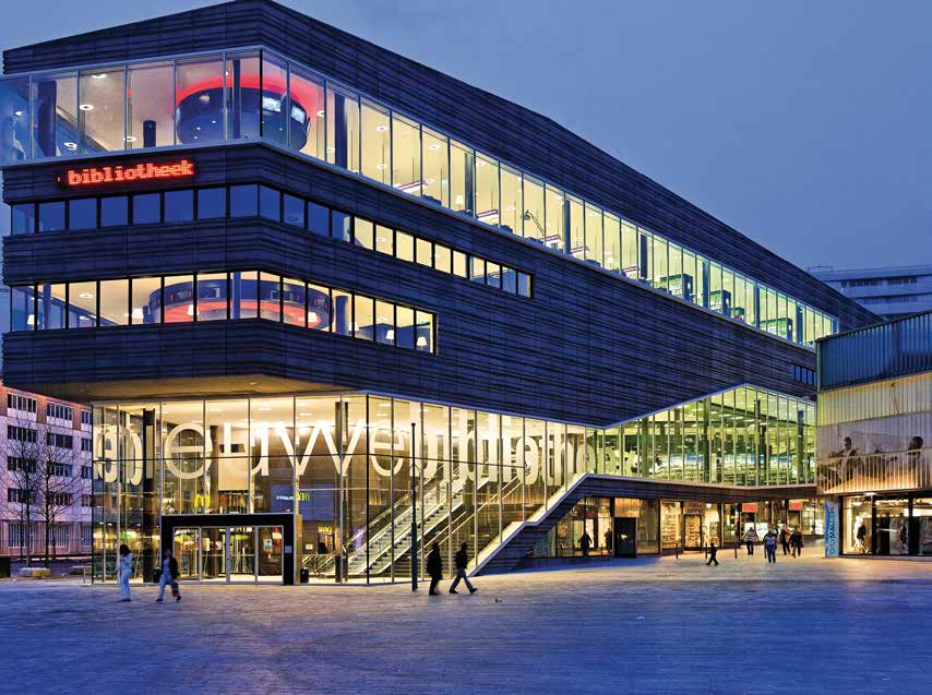 A very modern looking building with lots of lights
