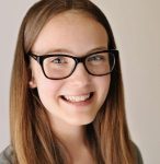 Closeup of young girl wearing glasses