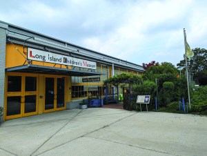 Long Island Children’s Museum’s east entrance and a view into the Our Backyard exhibit.