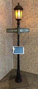 View of a lamp post with an ipad mounted on it with the cross streets of Kenilworth Ave. and Abbertsford Rd.
