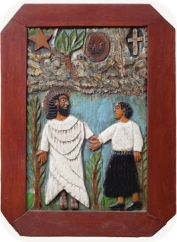 Two figures hold hands in front of a various pieces of iconography in this wood carving.