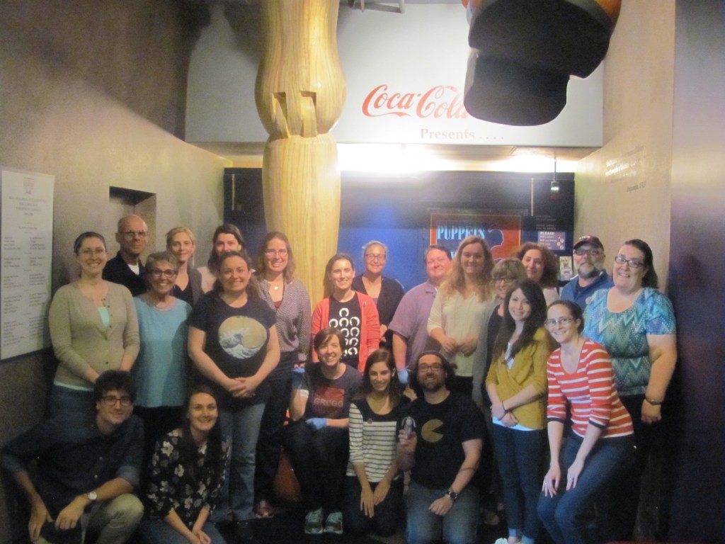 A large group of people pose for a photo.
