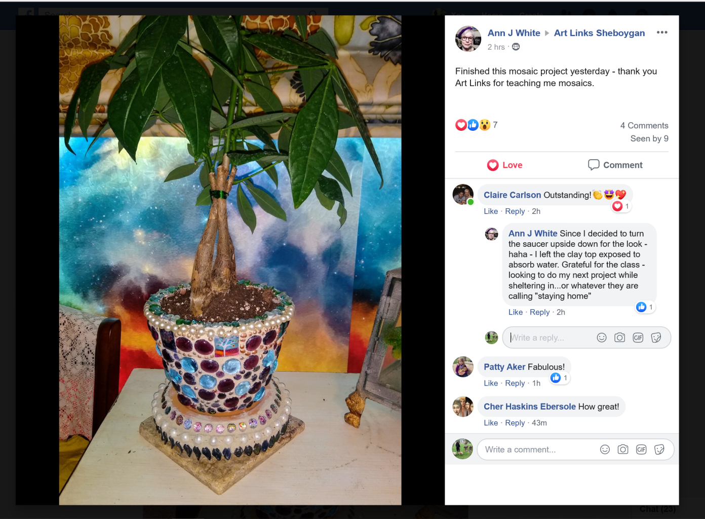 A program participant shares a mosaic vase they made.