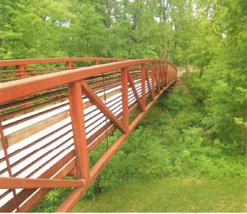 the Crystal Bridges Museum ofAmerican Art includes miles of trails on its wooded site.