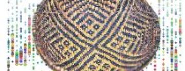 Image of a detailed bowl shaped basket with black geometric shapes and a triple X shaped cross in the center. 