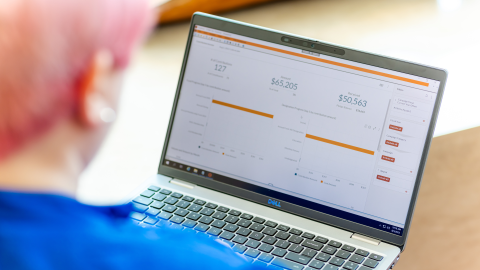 The Tessitura analytics screen as viewed on a laptop screen over someone's right shoulder.