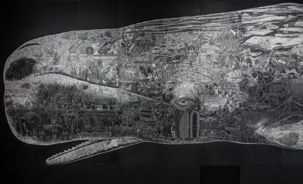 A close-up of the black-and-white scratchboard illustrated mural Or, the Whale, from the beginning of the sperm whale’s head to its fin. The mural shows hundreds of illustrations based on historic images. 