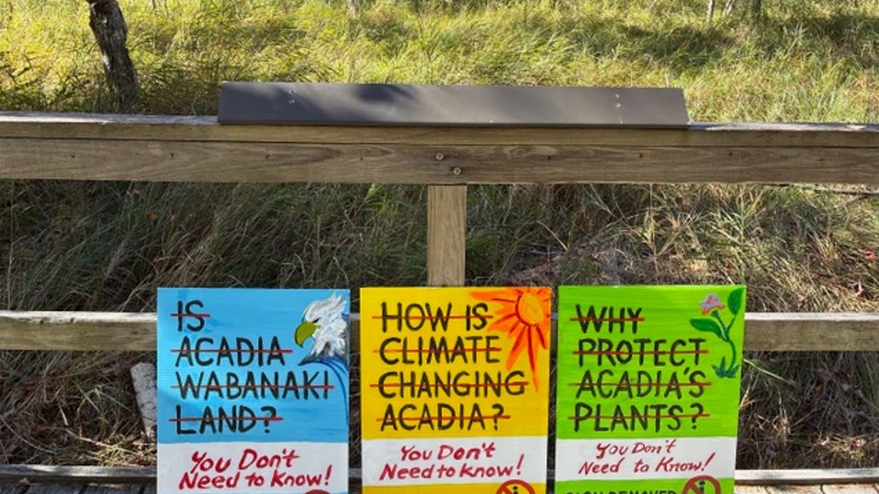 Protest signs at Acadia National Park