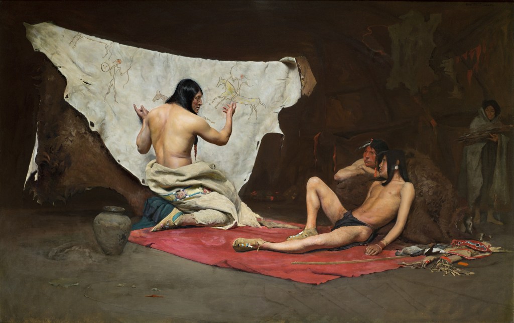 A realistic oil painting of two Indigenous figures, an older man and a boy, who sit closely together on the ground inside a lodge. The man points to pictographs on a large buffalo hide as the young man lounges yet pays close attention.
